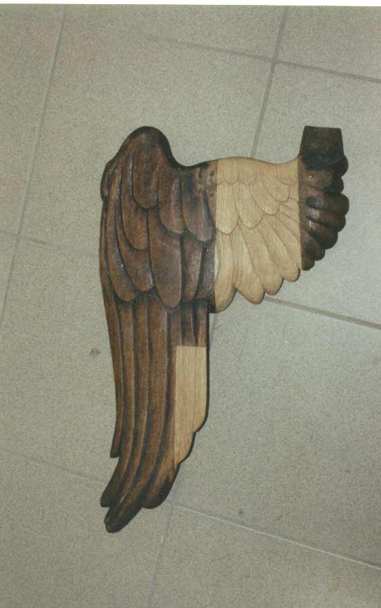 De restauratie van de vleugels.